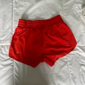 Athleta orange shorts